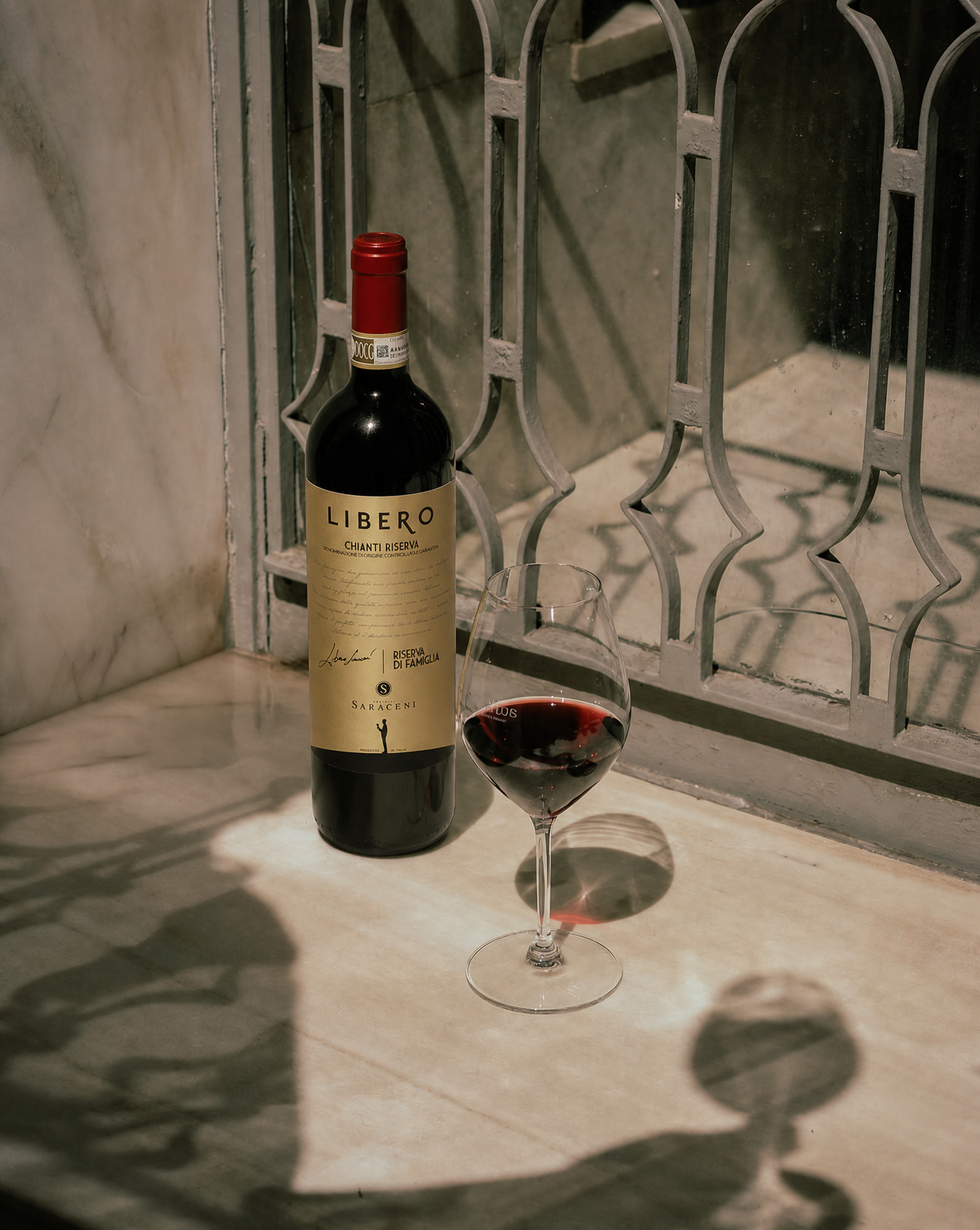 Libero Riserva di Famiglia — ruby red dry Chianti reserve red wine, 750ml, Saraceni Wines (editorial shot)