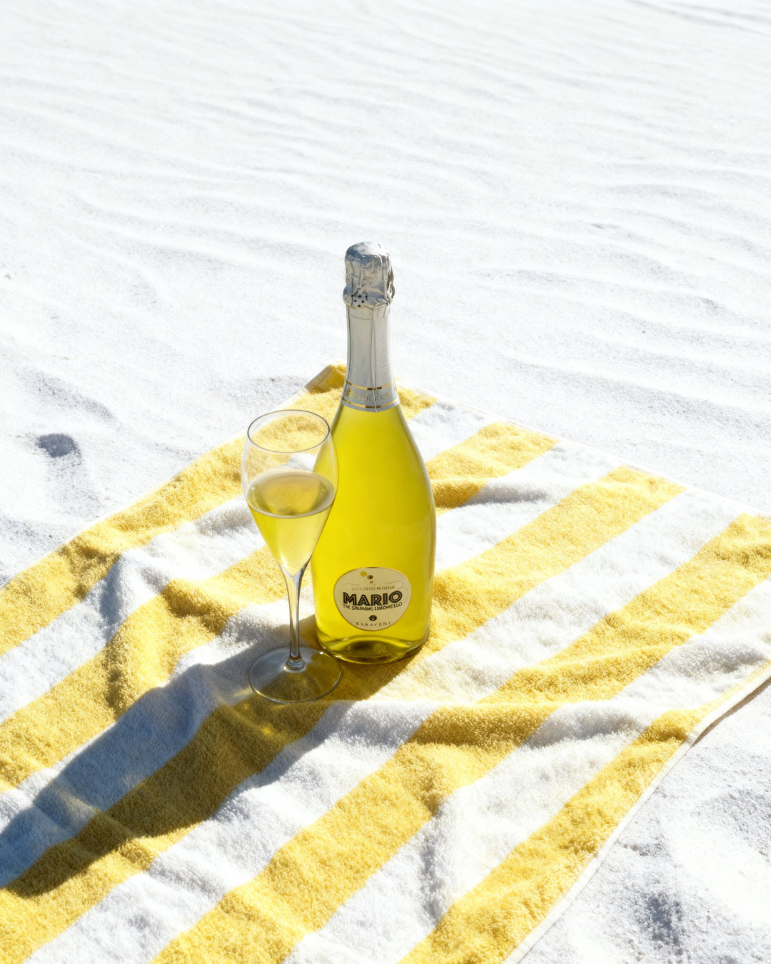 Mario Lemoncello Spritz — bright yellow sparkling sweet limoncello wine, 750ml, Saraceni Wines (lifestyle image)